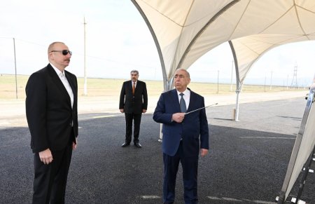 Prezident İlham Əliyev Hacıqabul rayonunda avtomobil yolunun açılışında istirak edib